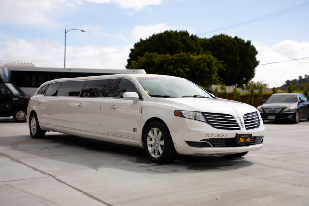 Luxury white LINCOLN MKT limousine for wedding and transfer for 8 Passengers left side view