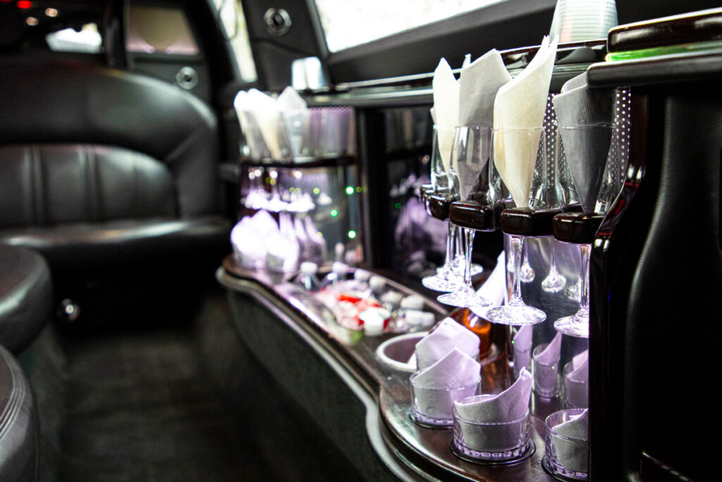 luxury black LINCOLN LIMO interior bar view for transferring 8 passengers