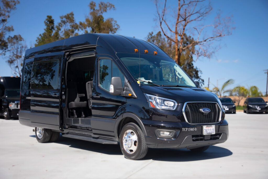 black FORD TRANSIT for 13 passengers left side view